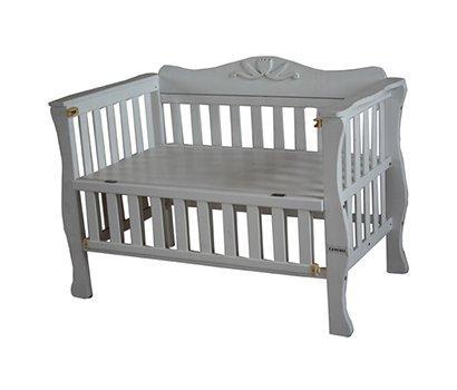 baby cot with carved flower